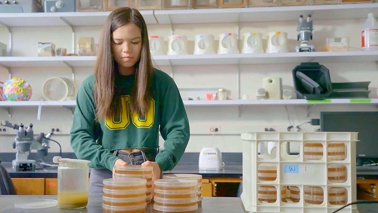 Photo of Piper doing petri dish experiments.