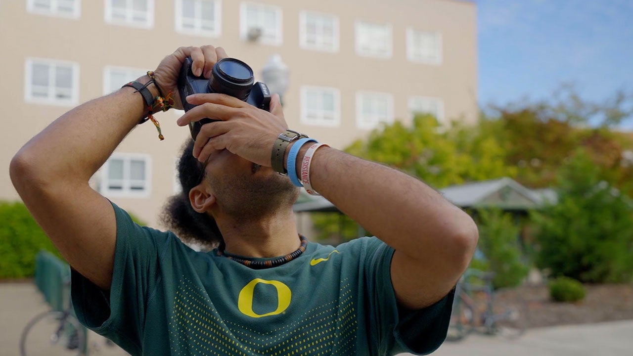 Student Photographing building